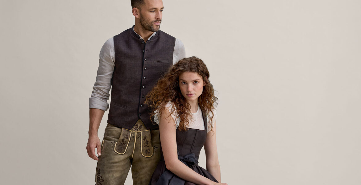 Moderne Tracht von Ludwig Beck mit Dirndl und Lederhose