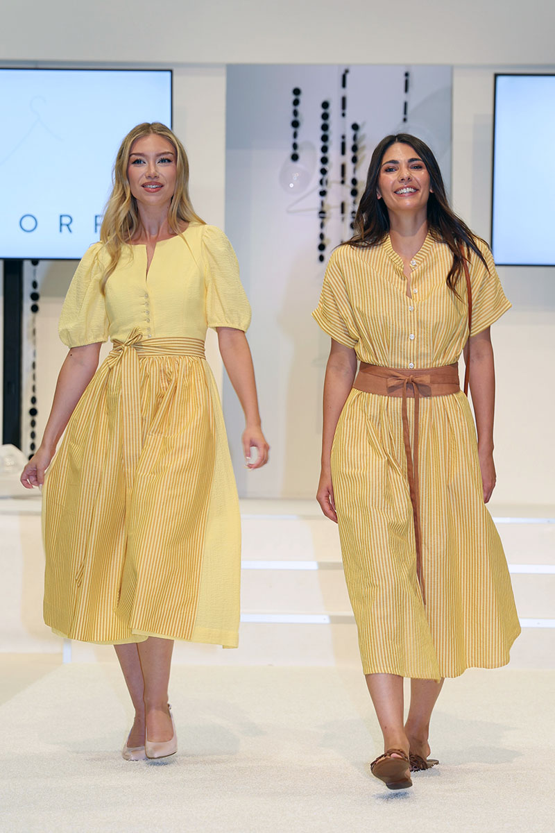 Gelbe Trachtenlooks mit Mieder und Rock auf der FESCH Fashion Show 2026.